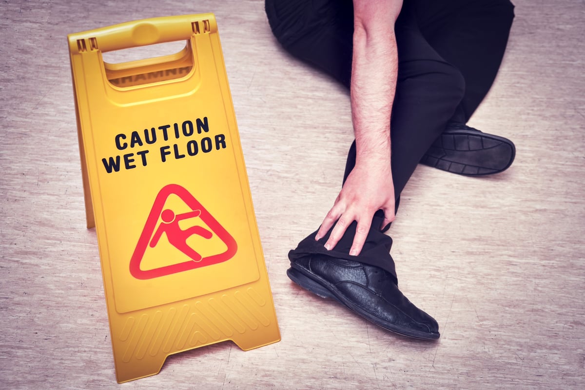 Caution wet floor warning - slip and fall danger hazard